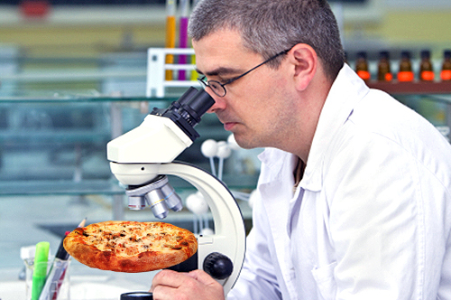 registered dietitian looking at pizza through a microscope
